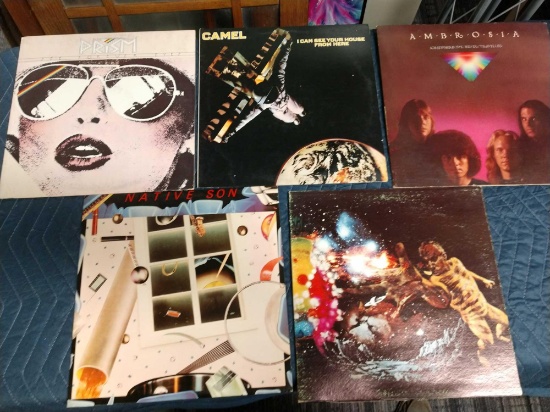 Five record albums including ambrosia, Camel, prism, native Sun, and Santana