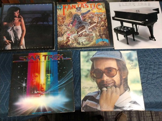 Five record albums including Elton John, Star Trek, and Linda Ronstadt