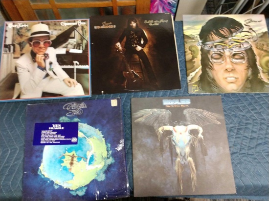 Five record albums including yes, eagles, manford man, Dave Edmunds, and Elton John
