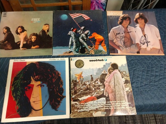 Five record albums including Alessi , and Woodstock
