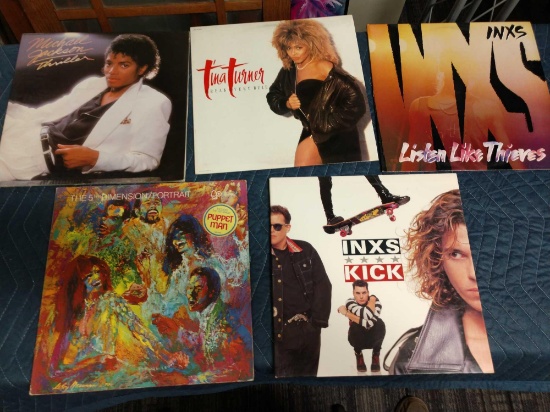 Five record albums including inxs, The 5th dimension, Tina Turner, and Michael Jackson