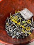 Large bucket of assorted nuts and bolts used