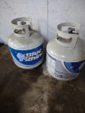 two 15 lb LP propane tanks
