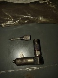 two grease gun adapters