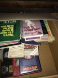 box of books and VHS movies