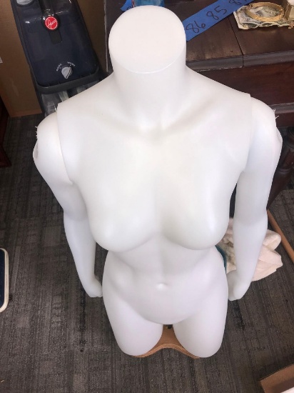 Half woman mannequin with arms