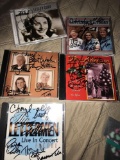 5- autographed cds