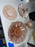 Six pieces of pink depression glass