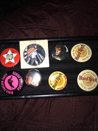 8- collectible button pins