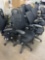 six black computer chairs