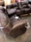 loveseat w/consol/canyon leather like needs repaired bring help to load come to preview