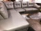 Ashley furniture gray leather like sectional couch bring help to load