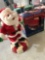 2- battery operated Santas