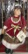 16 inch Christmas doll on swing