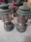two green Coleman lanterns