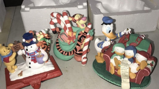 3- Disney figurines/stocking holder