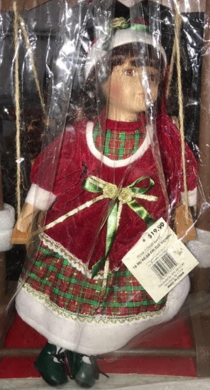 16 inch Christmas doll on swing