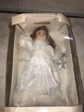 19 In porcelain animated doll