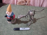 bobbing gnome and metal dinosaur