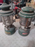 two green Coleman lanterns