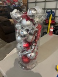 22 inch decorative vase full of Christmas ornaments