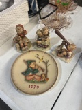 4 Hummel collectible figures and plate