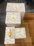 4 precious moments figurines in boxes