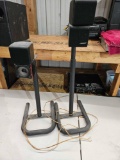 two bose Speakers with Stands