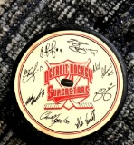 Burger King Detroit Hockey superstars autographed puck with stand