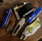 7- pocket knives/tools