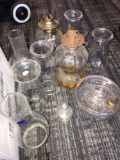 3- vintage oil lamps with extra chimneys