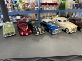 lot of eight diecast or plastic 1/18 scale cars
