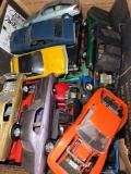 three large boxes of model cars missing parts
