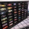 48- Nascar stock cars in a hanging display case