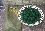 75- Clay marbles with leather bag