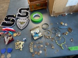 large lot of assorted vintage costume, jewelry class pens badges, ribbons, newer school, let