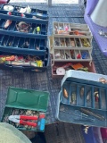 Group of five small tackle boxes