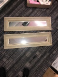 Pair of hanging mirrors