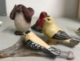 4- Resin bird figurines