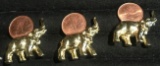 3- Canadian Pennies on gold elephants
