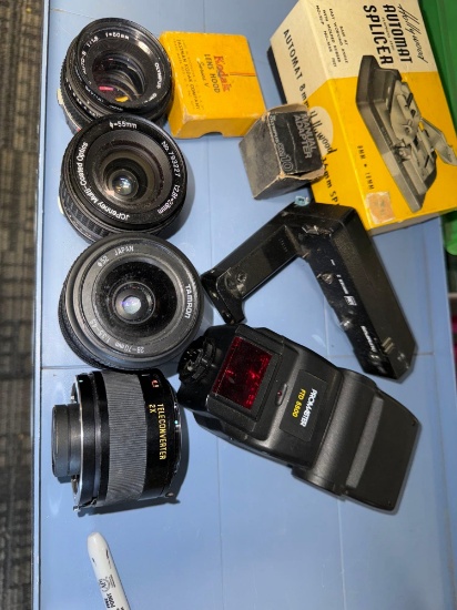 Group of Olympus camera lenses and more