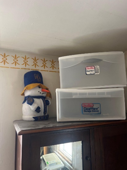 plastic storage drawers, and snowman. (upstairs)