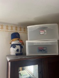 plastic storage drawers, and snowman. (upstairs)