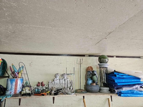 shelf of outdoor deco and tarps