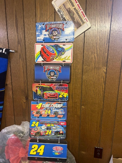 NASCAR license plates in basement