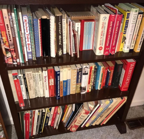 bookshelf with assorted books