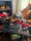 2 collector motorcycles, one Harley one wooden