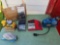 Drill bits / drill doctor, spark plug cleaner, and mini air compressor.
