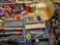 3 small toolboxes with contents.