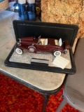 1935 Duesenburg J collectible car in case
